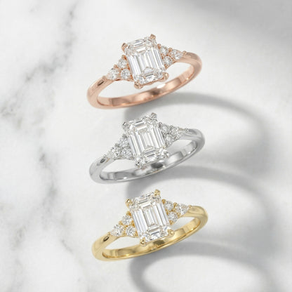 Emerald Cut Lab Grown Diamond Engagement Ring with side stone clusters set in Yellow Gold