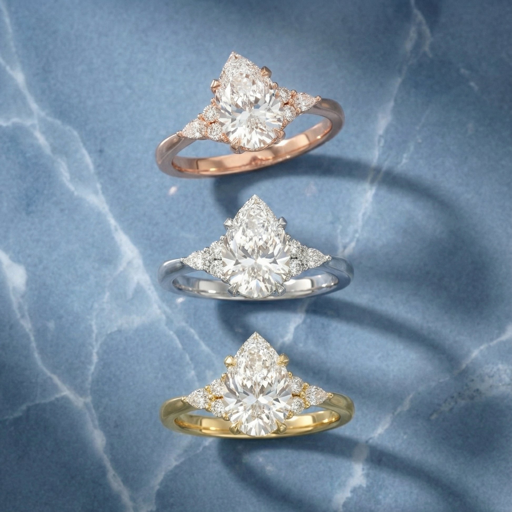 Pear Cut Lab Grown Diamond Three Stone Engagement Ring in Yellow Gold