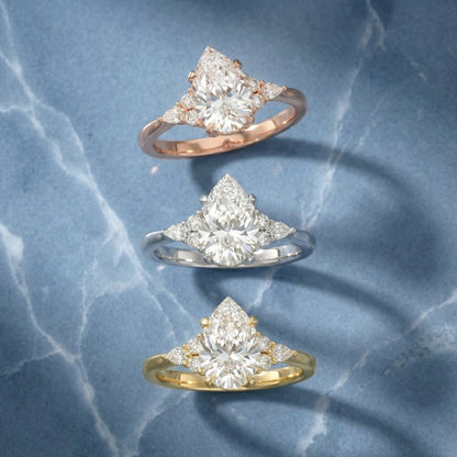 Pear Cut Lab Grown Diamond Three Stone Engagement Ring in Yellow Gold