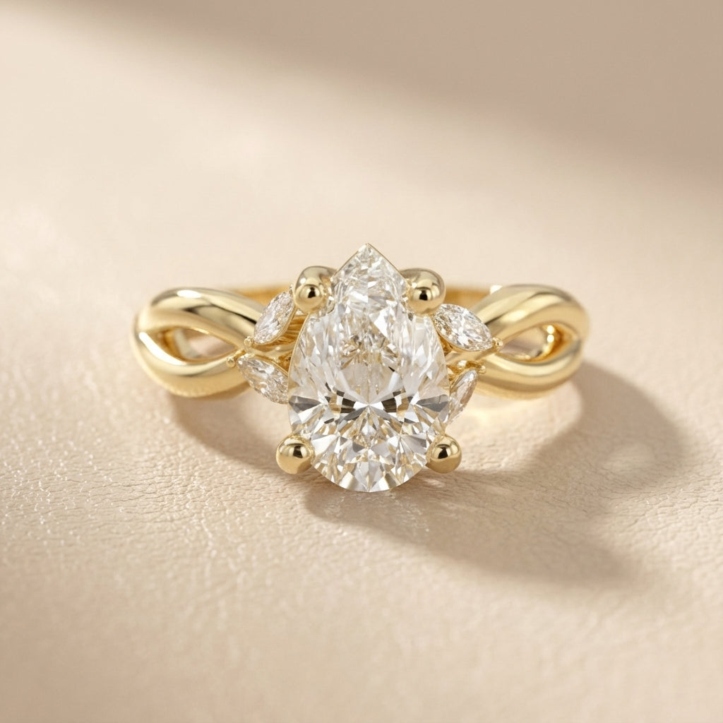 Pear Cut Lab Grown Diamond Twisted Engagement Ring in Yellow Gold