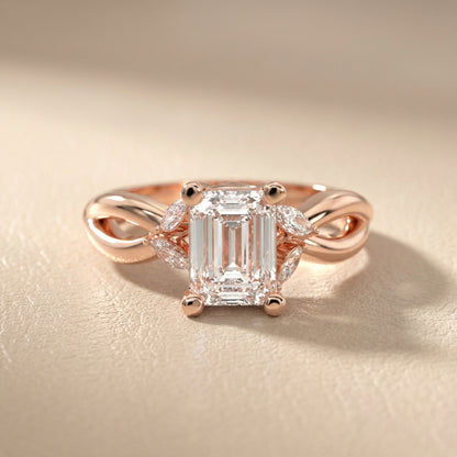Emerald Cut Lab Grown Diamond Twisted Engagement Ring in Rose Gold with Marquise Side Stones