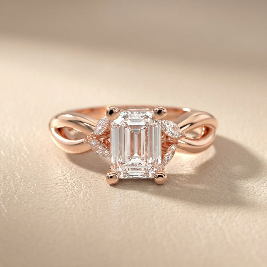 Emerald Cut Lab Grown Diamond Twisted Engagement Ring in Rose Gold with Marquise Side Stones