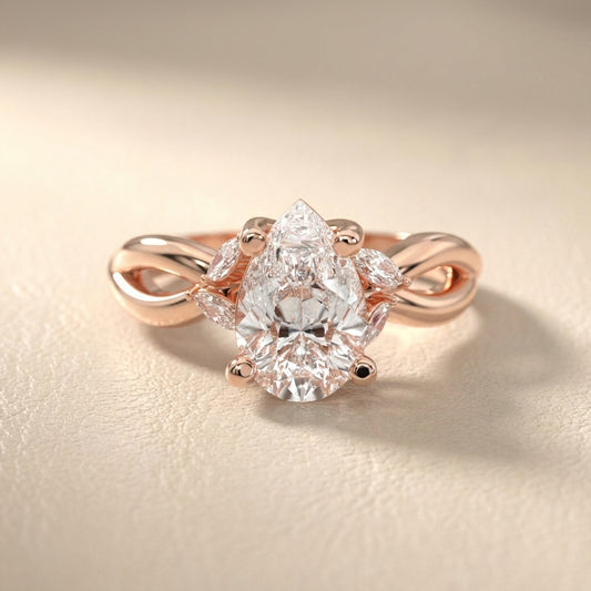 Pear Cut Lab Grown Diamond Twisted Engagement Ring in Rose Gold