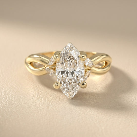Marquise Cut Lab Grown Diamond Twisted Engagement Ring in Yellow Gold with side stones