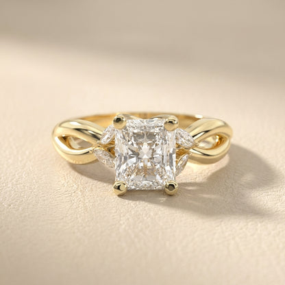Radiant Cut Lab Grown Diamond Engagement Ring with Marquise Side Stones in Yellow Gold with Twisted Band