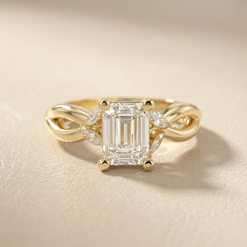 Emerald Cut Lab Grown Diamond Twisted Engagement Ring in Yellow Gold with Marquise Side Stones