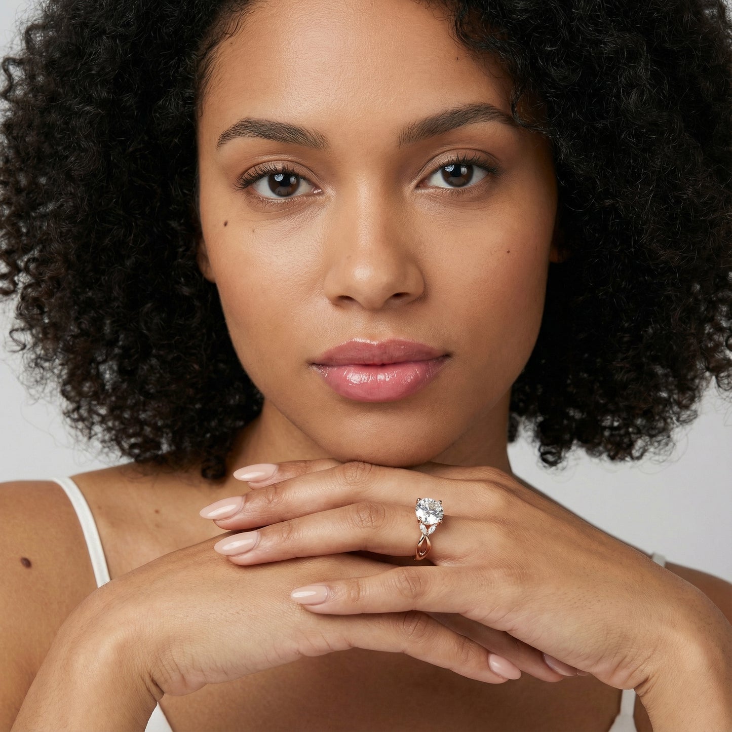 Round Cut Lab Grown Diamond Twisted Engagement Ring in Rose Gold