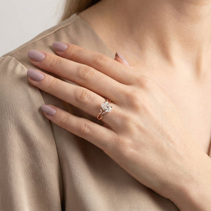 Pear Cut Lab Grown Diamond Twisted Engagement Ring in Rose Gold