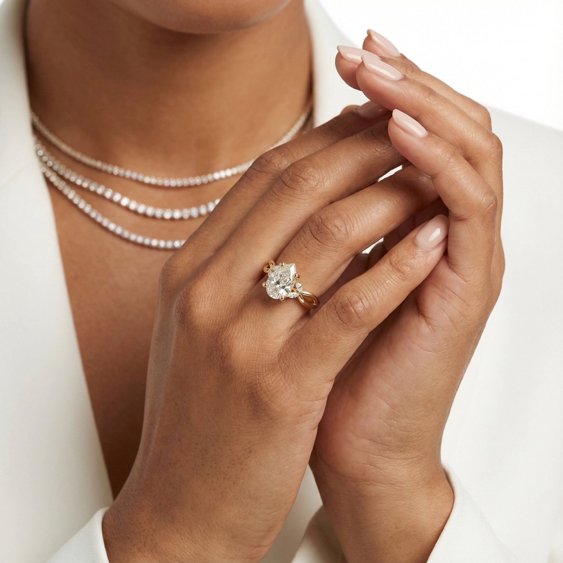 Pear Cut Lab Grown Diamond Twisted Engagement Ring in Yellow Gold