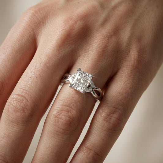 Radiant Cut Lab Grown Diamond Engagement Ring with Marquise Side Stones in Platinum with Twisted Band