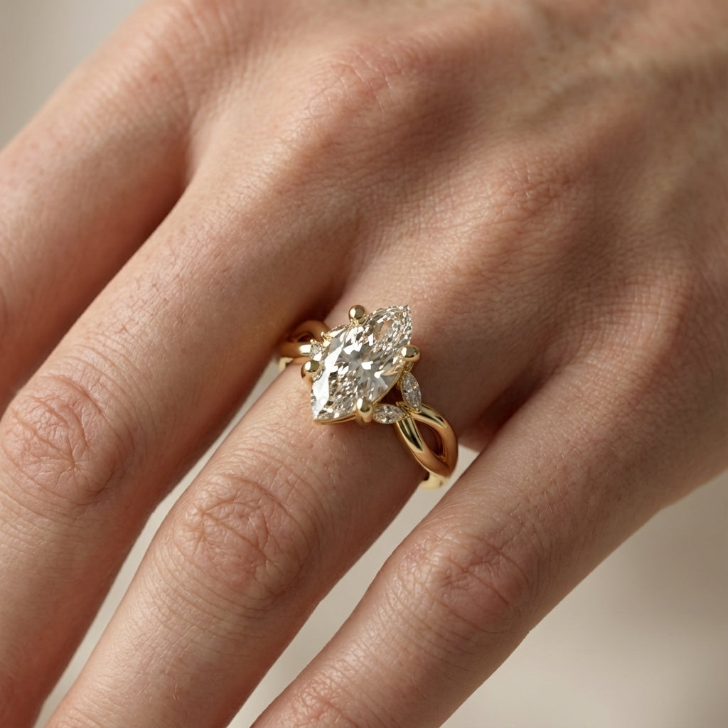 Marquise Cut Lab Grown Diamond Twisted Engagement Ring in Yellow Gold with side stones