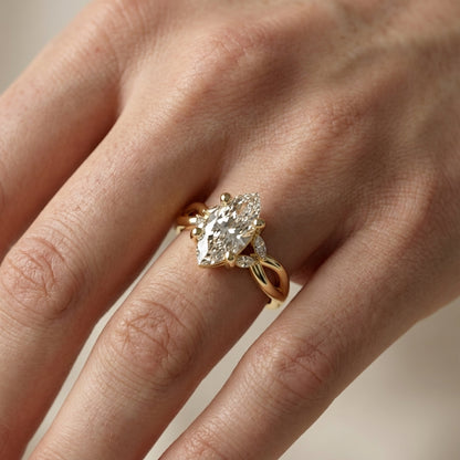 Marquise Cut Lab Grown Diamond Twisted Engagement Ring in Yellow Gold with side stones