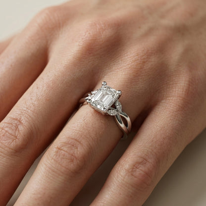 Emerald Cut Lab Grown Diamond Twisted Engagement Ring in Platinum with Marquise Side Stones