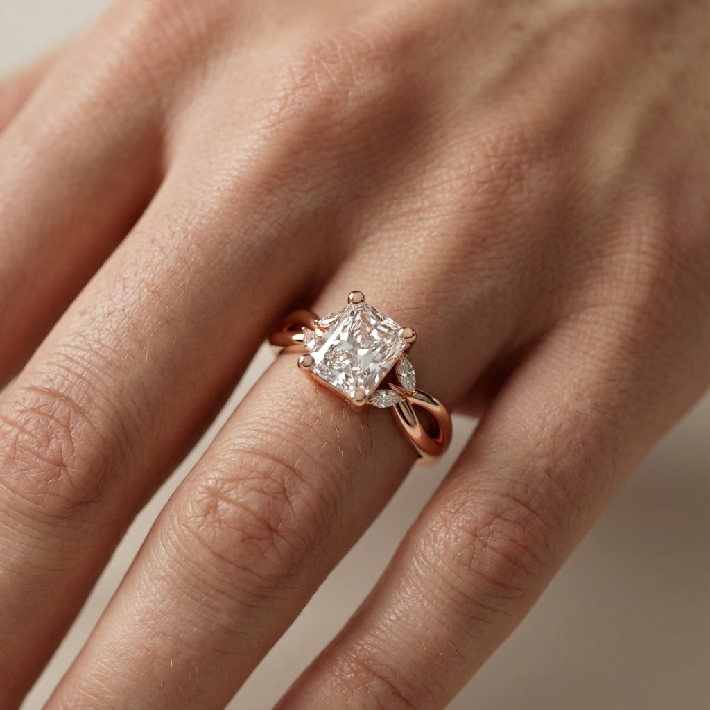 Radiant Cut Lab Grown Diamond Engagement Ring with Marquise Side Stones in Rose Gold with Twisted Band
