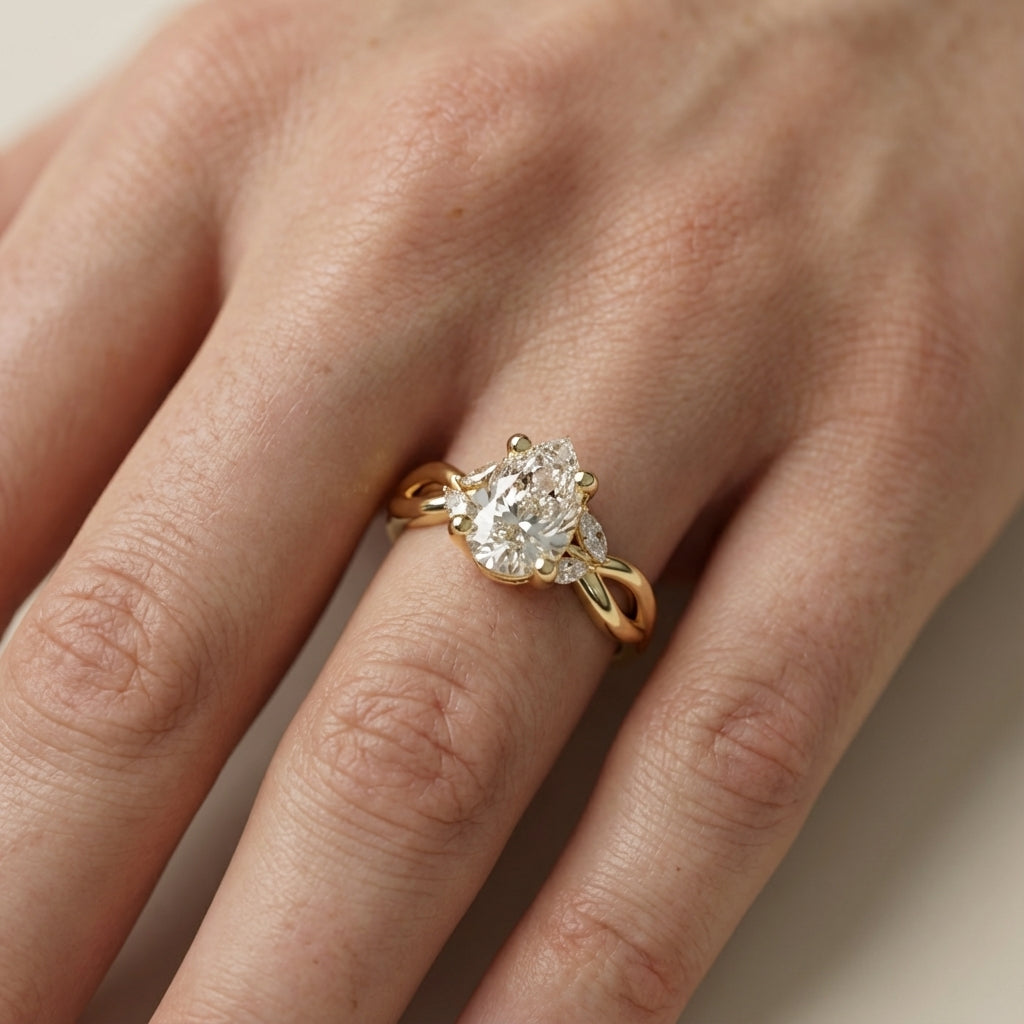Pear Cut Lab Grown Diamond Twisted Engagement Ring in Yellow Gold