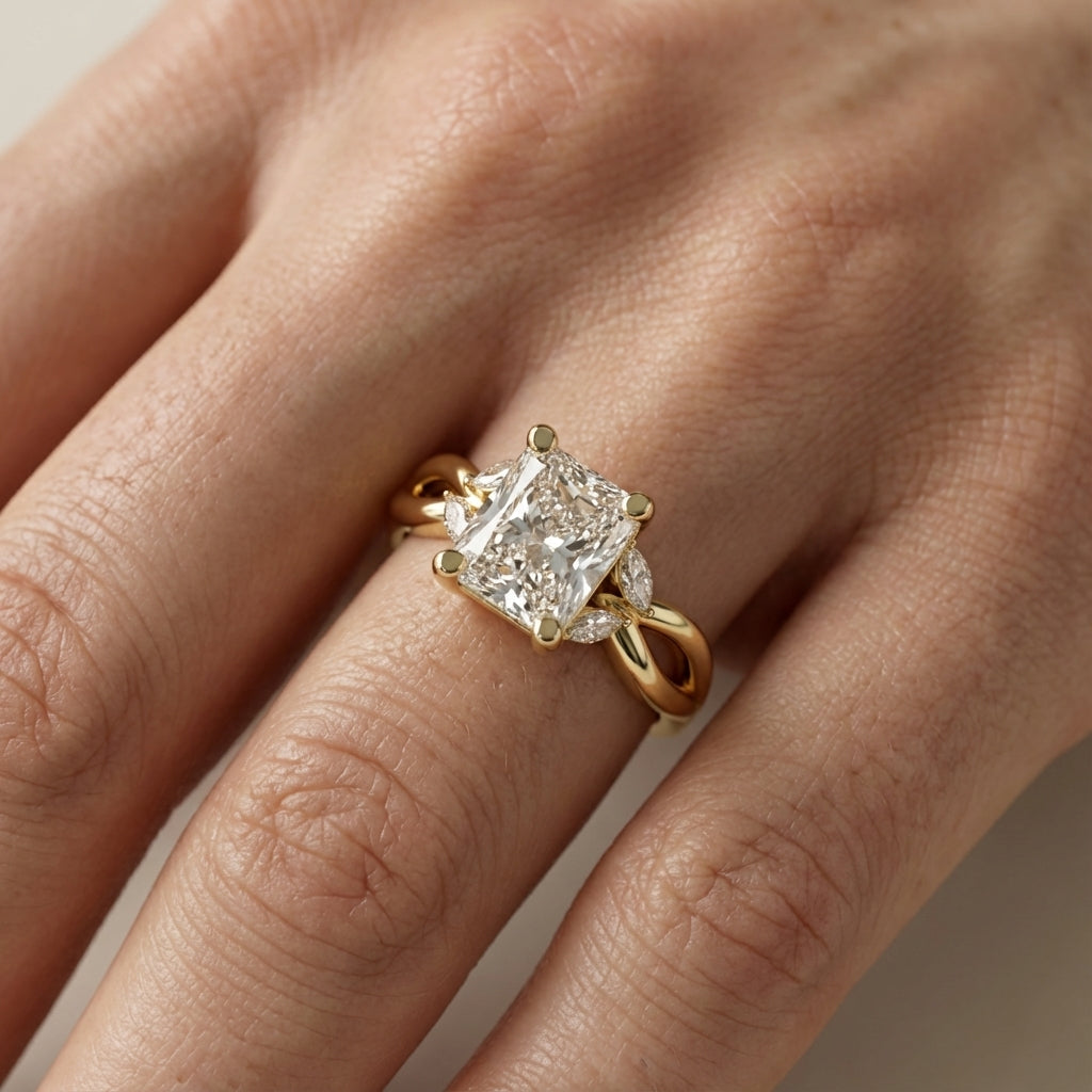 Radiant Cut Lab Grown Diamond Engagement Ring with Marquise Side Stones in Yellow Gold with Twisted Band