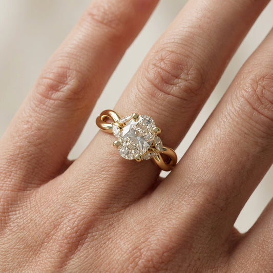 Oval Cut Lab Grown Diamond Twisted Engagement Ring in Yellow Gold