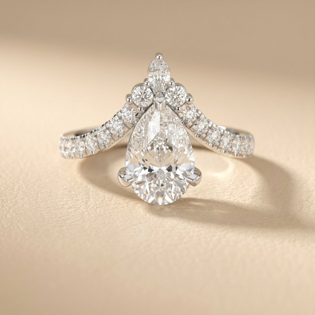 Pear Cut Lab Grown Diamond Engagement Ring in White Gold with side stone accents