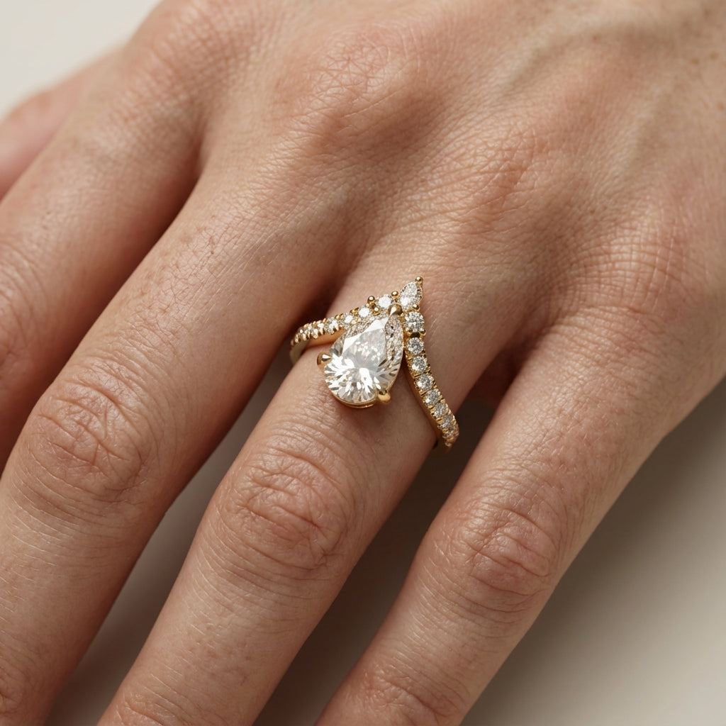 Pear Cut Lab Grown Diamond Engagement Ring in Yellow Gold with side stone accents