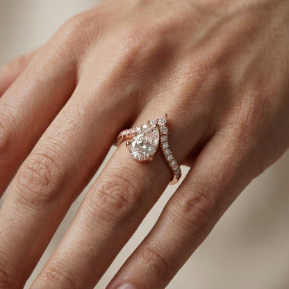 Pear Cut Lab Grown Diamond Engagement Ring in Rose Gold with side stone accents