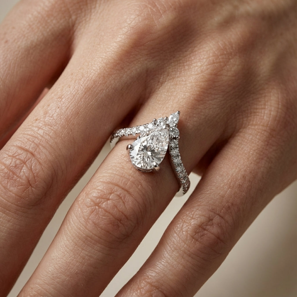 Pear Cut Lab Grown Diamond Engagement Ring in White Gold with side stone accents