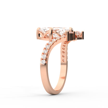 Rose gold engagement ring featuring a marquise cut lab grown diamond and intricate side stone details.