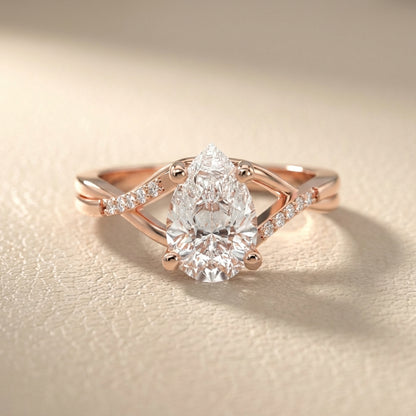 Pear Cut Lab Grown Diamond Engagement Ring with Twisted Band in Rose Gold