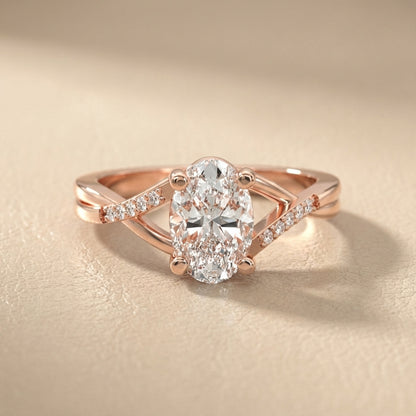 Oval Cut Lab Grown Diamond Engagement Ring in Rose Gold with twisted pave band