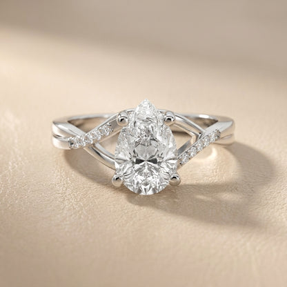 Pear Cut Lab Grown Diamond Engagement Ring with Twisted Band in Platinum