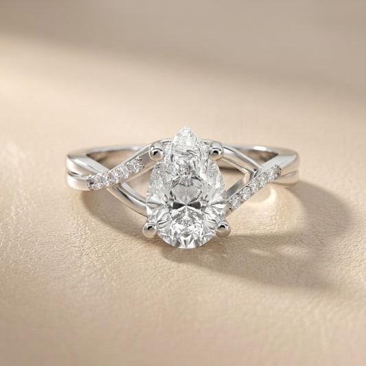 Pear Cut Lab Grown Diamond Engagement Ring with Twisted Band in Platinum