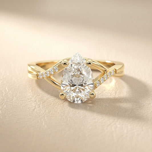 Pear Cut Lab Grown Diamond Engagement Ring with Twisted Band in Yellow Gold