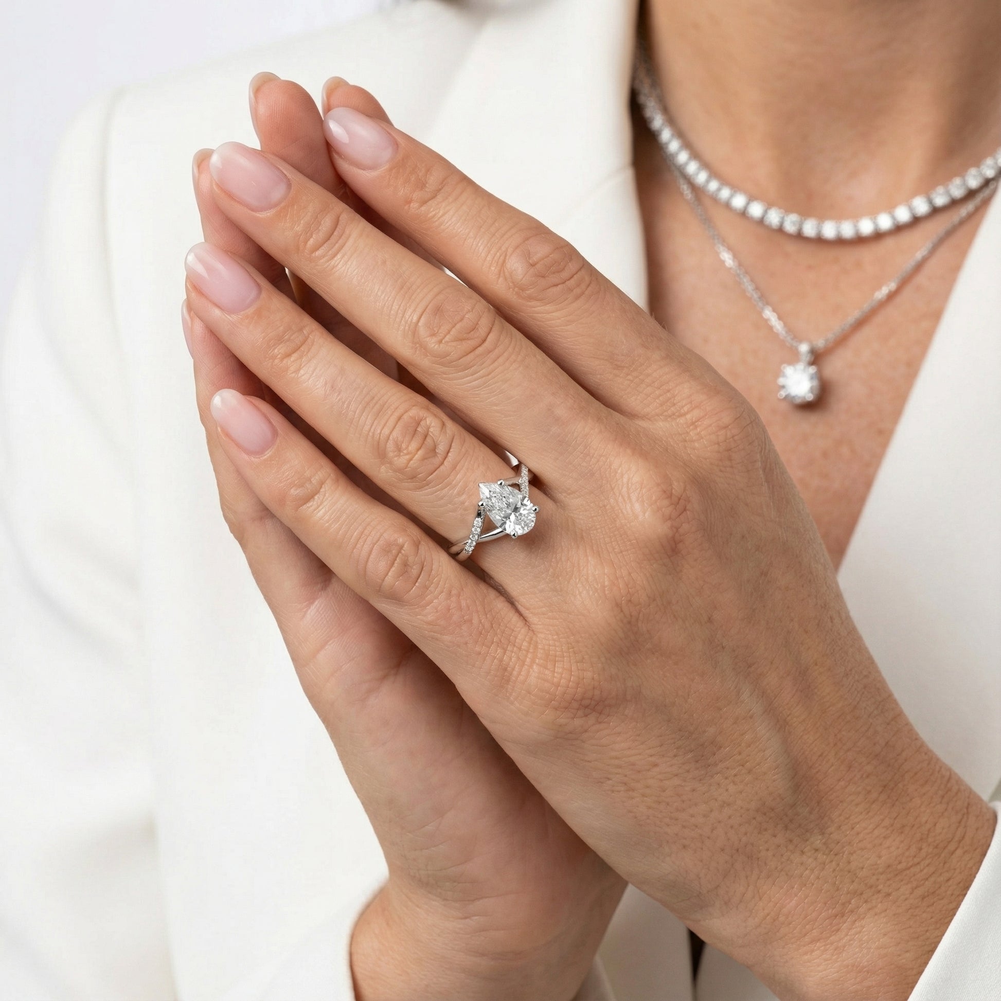 Pear Cut Lab Grown Diamond Engagement Ring with Twisted Band in Silver