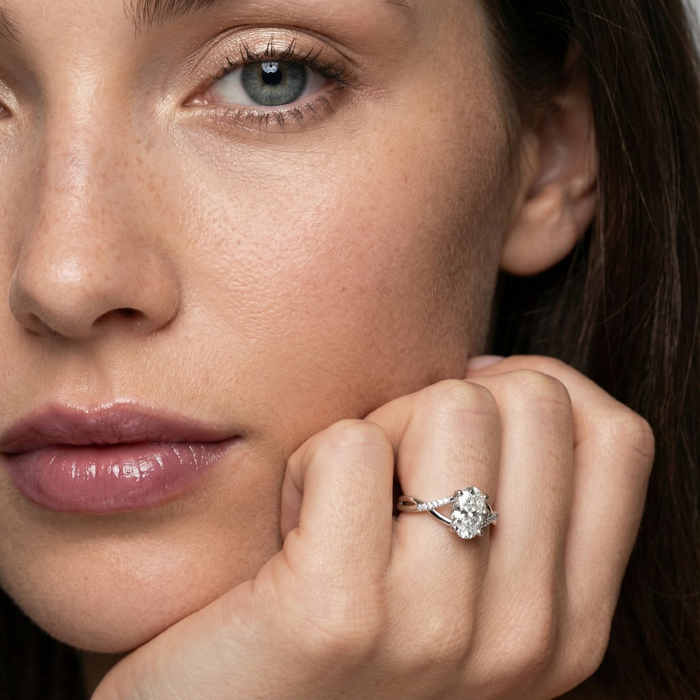 Oval Cut Lab Grown Diamond Engagement Ring in White Gold with twisted pave band