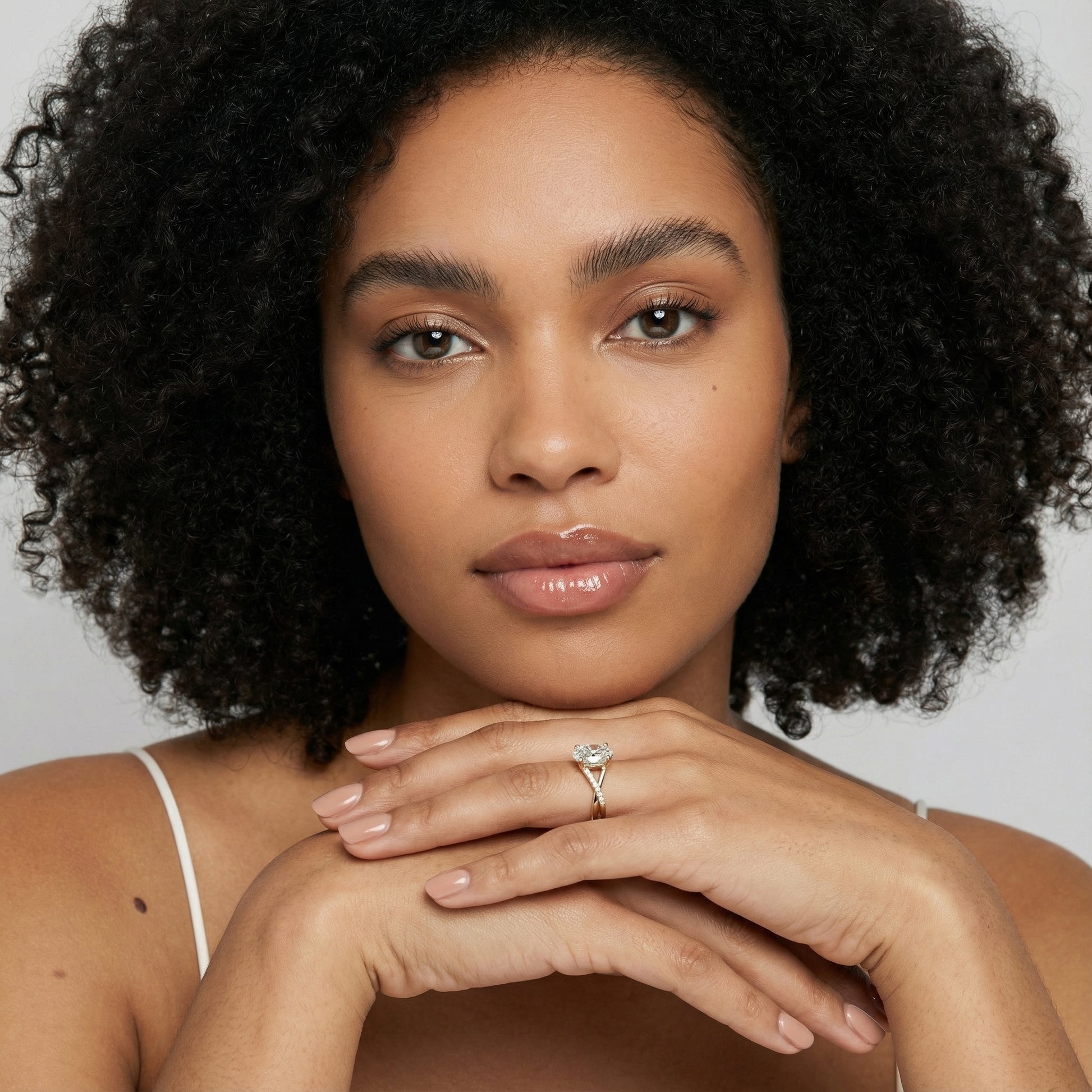 Oval Cut Lab Grown Diamond Engagement Ring in Yellow Gold with twisted pave band