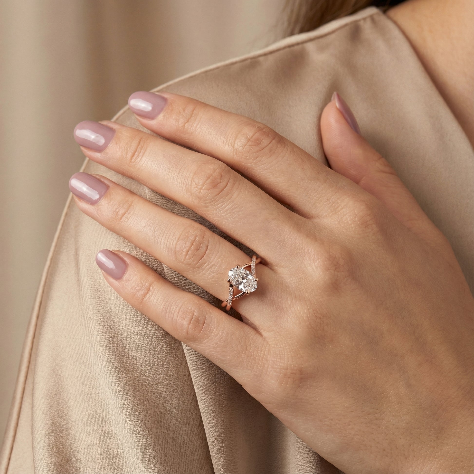 Oval Cut Lab Grown Diamond Engagement Ring in Rose Gold with twisted pave band