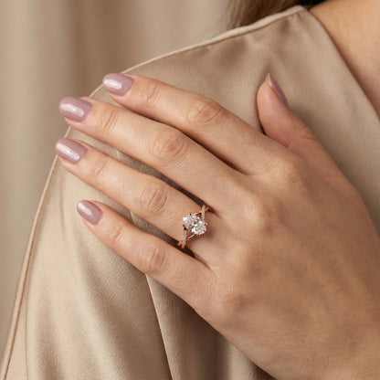 Oval Cut Lab Grown Diamond Engagement Ring in Rose Gold with twisted pave band