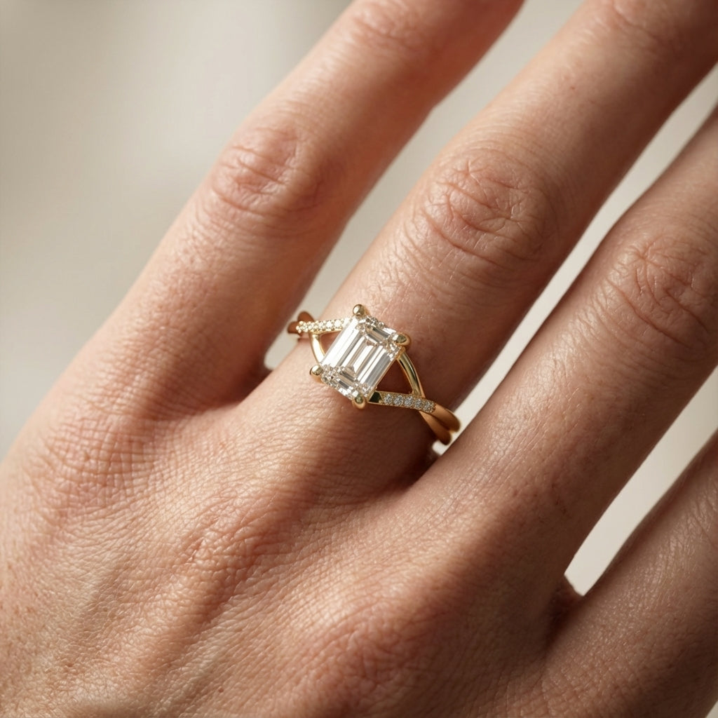 Emerald Cut Lab Grown Diamond Side Stone Engagement Ring in Yellow Gold