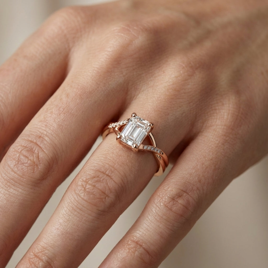 Emerald Cut Lab Grown Diamond Side Stone Engagement Ring in Rose Gold