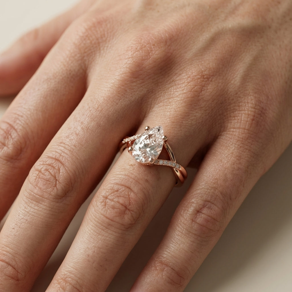 Pear Cut Lab Grown Diamond Engagement Ring with Twisted Band in Rose Gold