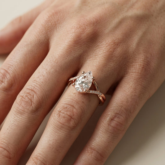 Pear Cut Lab Grown Diamond Engagement Ring with Twisted Band in Rose Gold