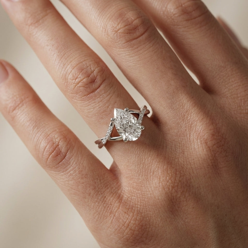 Pear Cut Lab Grown Diamond Engagement Ring with Twisted Band in Silver