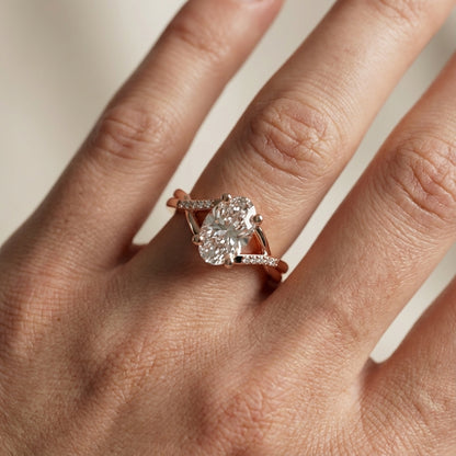 Oval Cut Lab Grown Diamond Engagement Ring in Rose Gold with twisted pave band