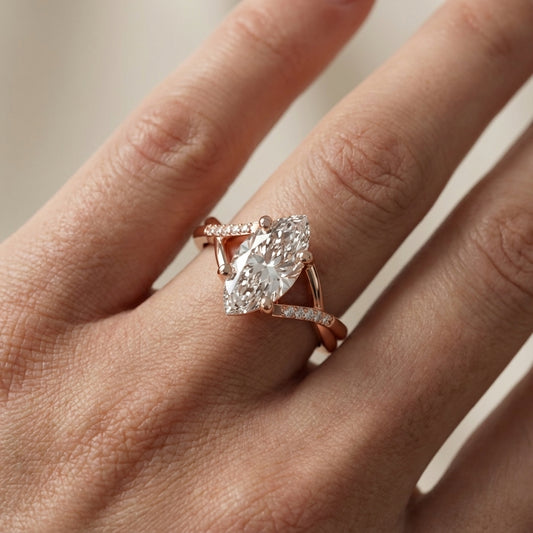 Marquise Cut Lab Grown Diamond Side Stone Twist Engagement Ring in Rose Gold
