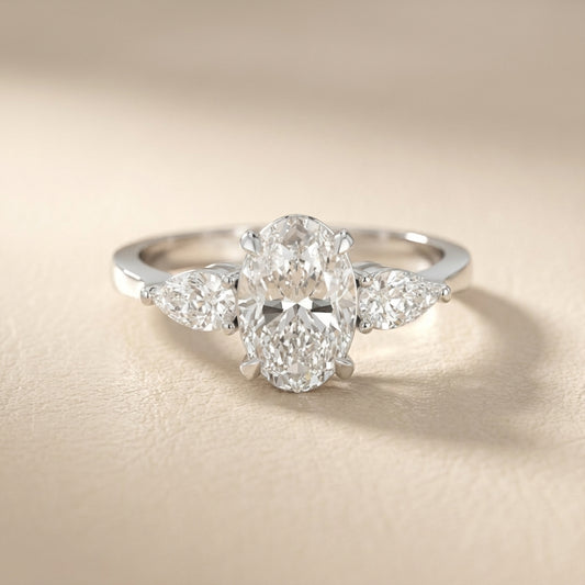 Oval Cut Lab Grown Diamond Three Stone Engagement Ring in Silver