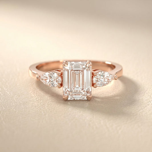 Grace Three Stone Emerald Cut Lab Grown Diamond Engagement Ring set in Rose Gold