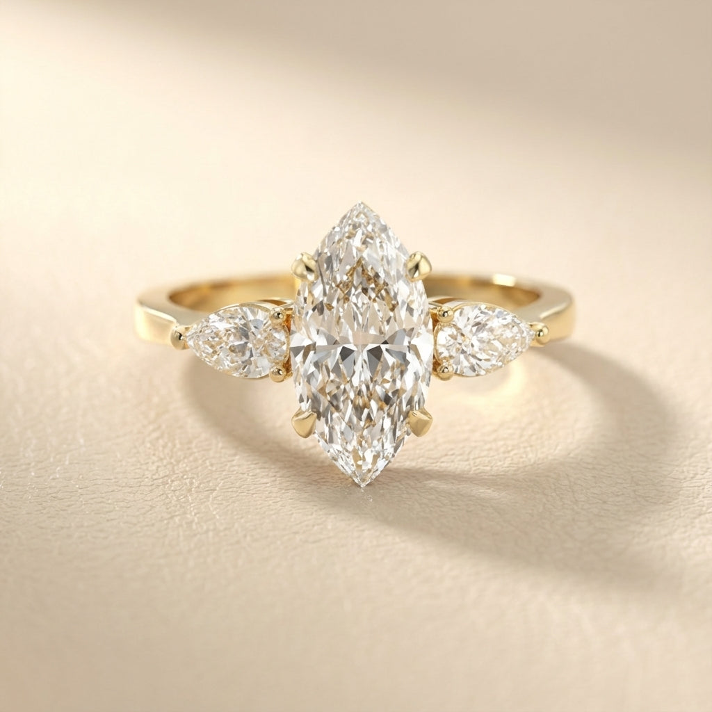 Grace Three Stone Marquise Cut Lab Grown Diamond Engagement Ring in Yellow Gold