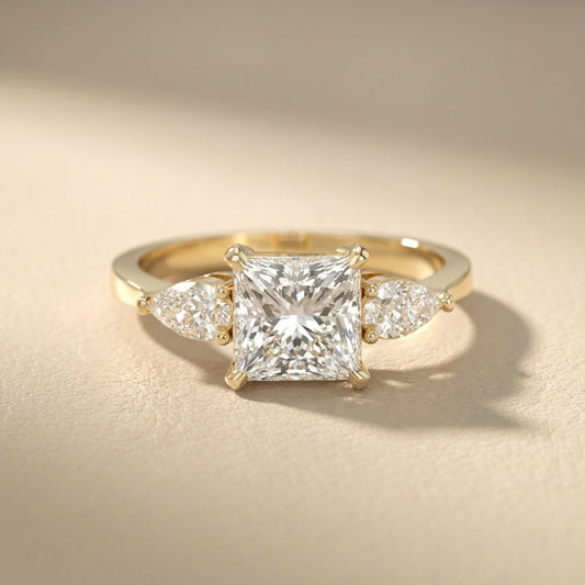 Princess Cut Lab Grown Diamond Three Stone Engagement Ring in Yellow Gold with pear side stones