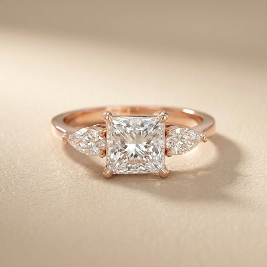 Princess Cut Lab Grown Diamond Three Stone Engagement Ring in Rose Gold with pear side stones
