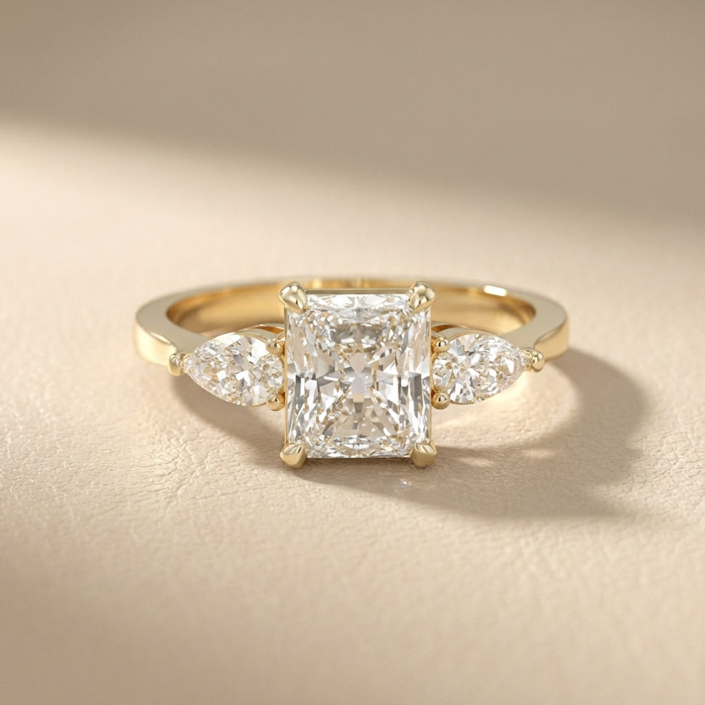 Radiant Cut Lab Grown Diamond Three Stone Engagement Ring in Yellow Gold