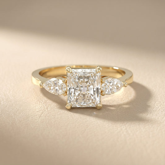 Radiant Cut Lab Grown Diamond Three Stone Engagement Ring in Yellow Gold